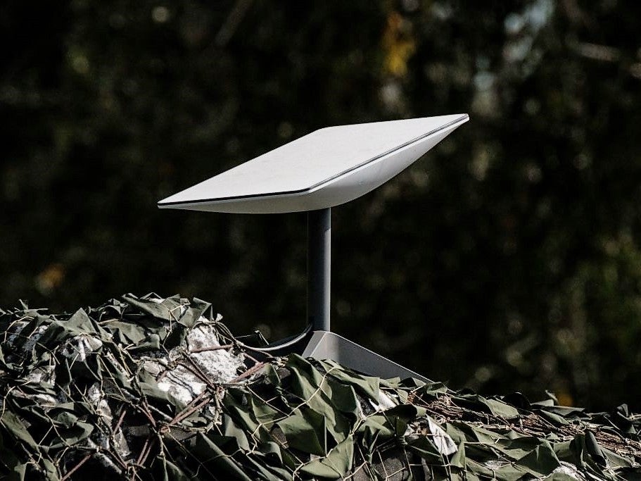 An antenna of the Starlink satellite-based broadband system donated by Elon Musk in Izyum in the Kharkiv region of Ukraine in the first year of Russia’s war